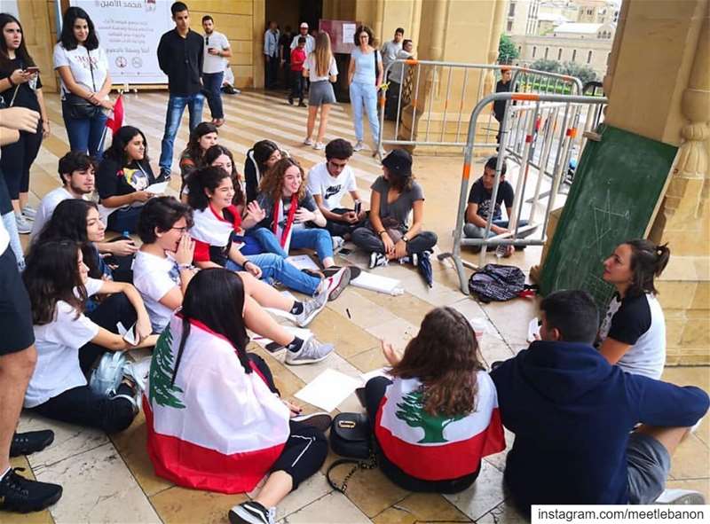 A math teacher is giving her class at the Martyr Square! This is the... (Beirut, Lebanon)