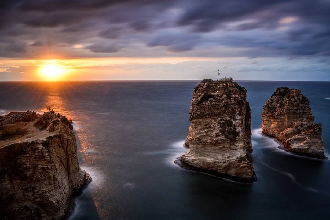 A stormy sunset | The Pigeon rocks of Rawche, Beirut  livelovebeirut. 45... (Beirut, Lebanon)