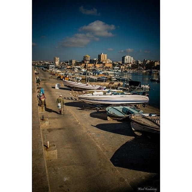  boats  harbor  shades  sea  deck  sun  sky  buildings  tyre  livelovetyre... (Tyre, Lebanon)