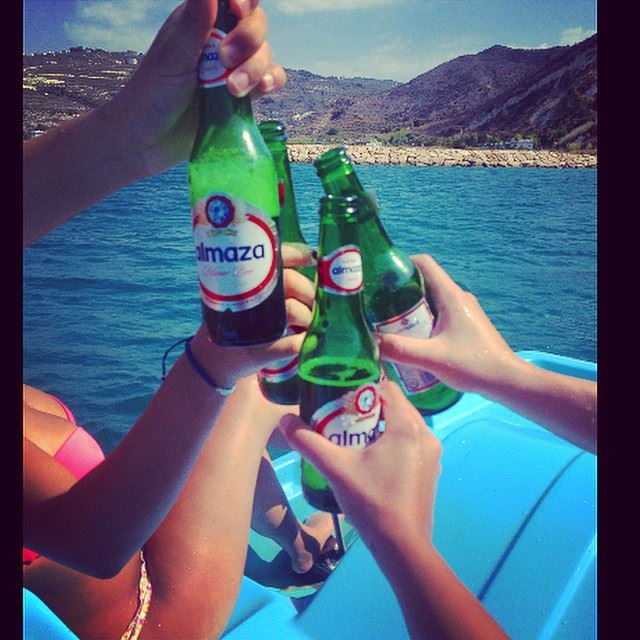  cheers  almaza  beer  middle of the  sea  mountain  view  relaxing  chill...