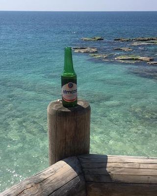 Cheers 🍻 cheers  sun  beach  spring  beer  almaza  livelovelebanon ... (Kfarabida Batroun)