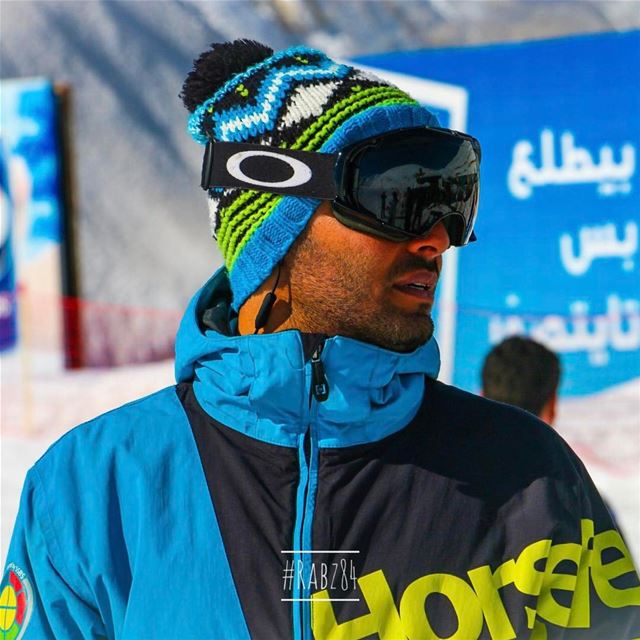 Every snowboarder's got his moment; ear phones, profile look and fashioned... (Mzaar Kfardebian Ski Resort)