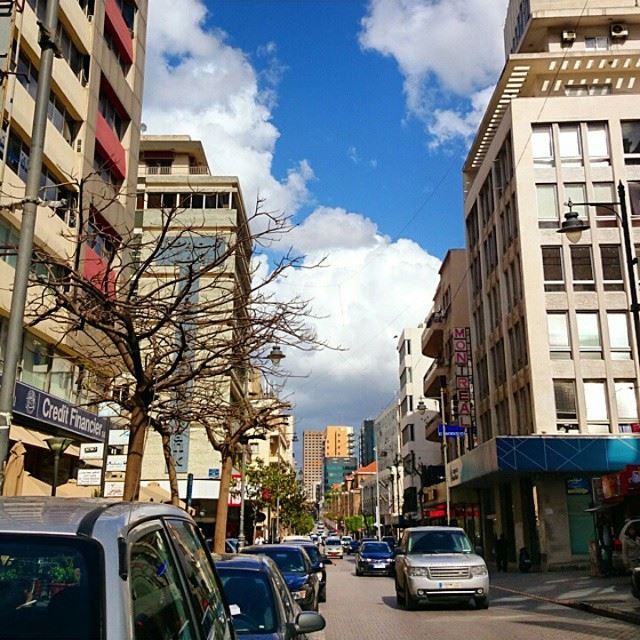 Hamra street in Beirut on a sunny cloudy day.
