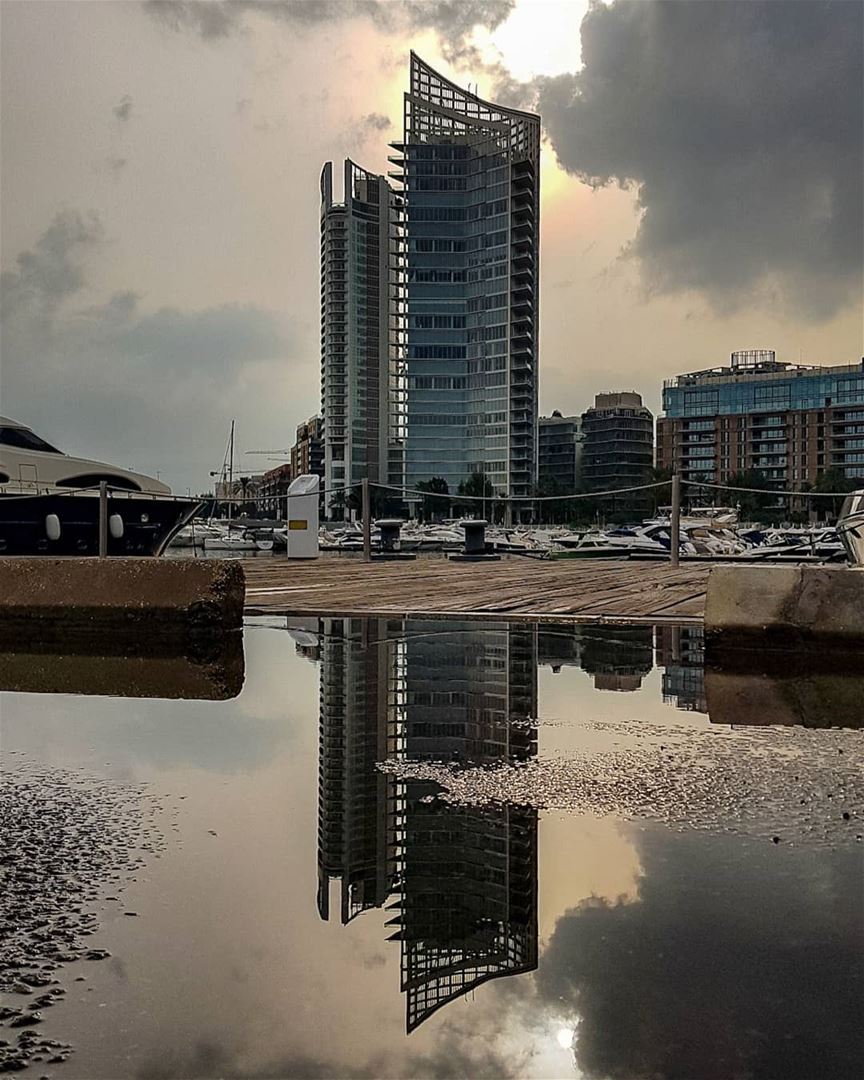 How many times have we shared the reflection of these buildings.. yes that... (Zaitunay Bay)