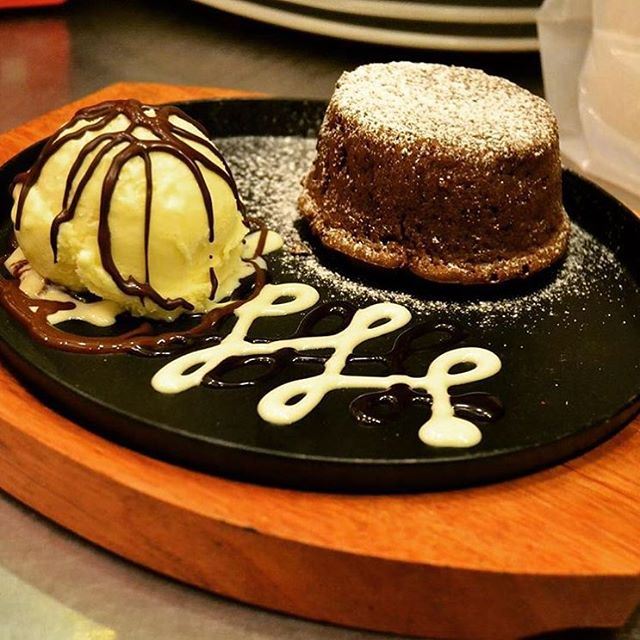 I didn't hear the question, but the answer is Chocolate Foundan with ice cream @chocolate_bar_hamra  (Chocolate Bar)