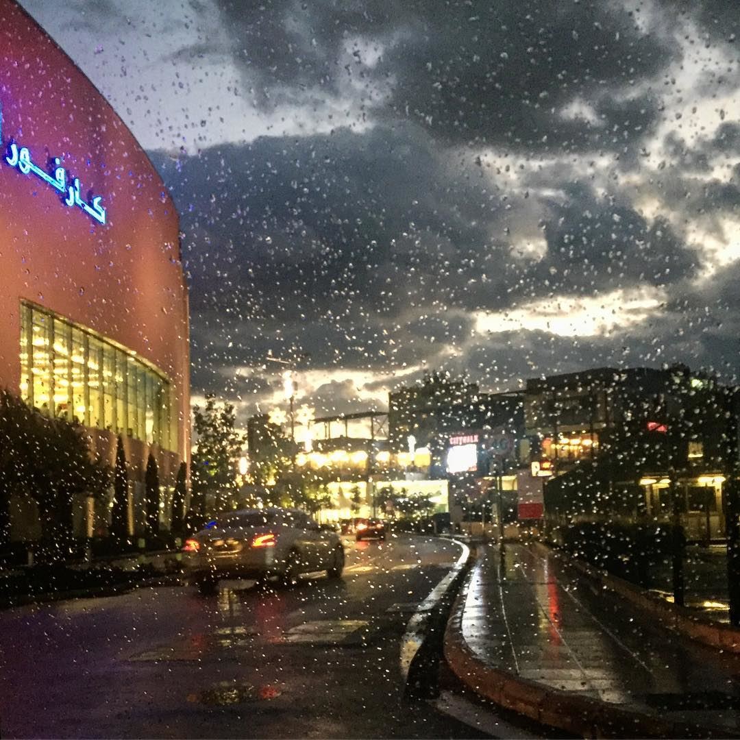 I love the rain. I love how it softens the outlines of things. The world... (Carrefour Lebanon)