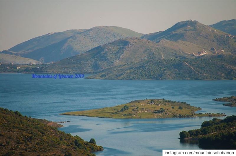 Just an island in a blue lake surrounded by green hills ... roadtrip ... (Qaraaoun, Béqaa, Lebanon)