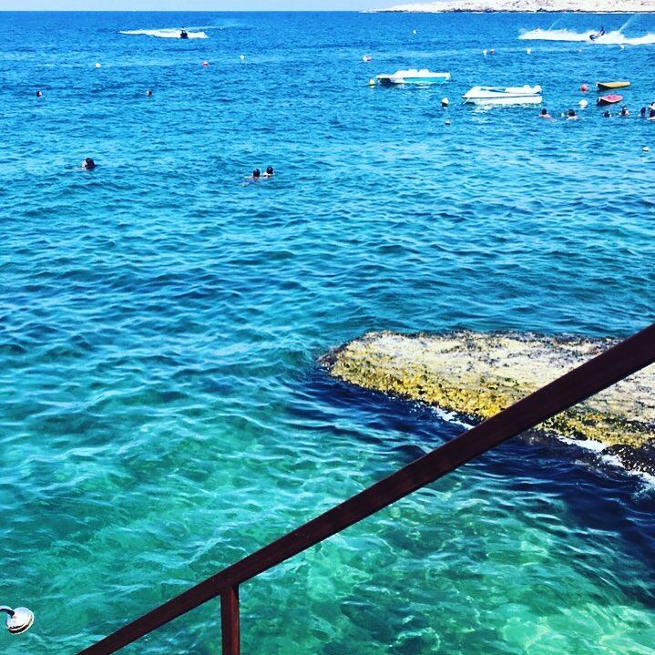 Lebanon's Santorini 🇱🇧. enfeh  lazy  beach  sea  pool  grass  feet ... (Wassim 3al Ba7er)