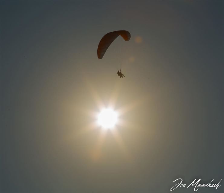 Life is either a daring adventure or nothing!  paragliding  sky  sun ...