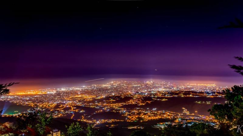Night picture of beirut,  the 2 lines in the mid picture are 2 plain on...