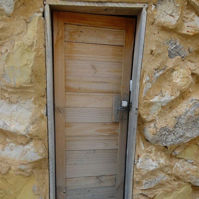 old doors stonewalls wood