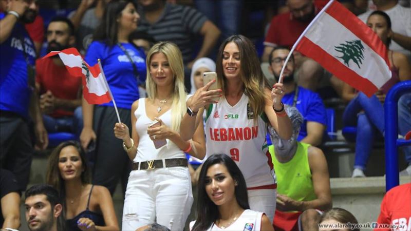 People cheering during the FIBA Asia Champions Cup Between Lebanon and South Korea, in Zouk Mikael north of Beirut, Lebanon. (Hussein Baydoun / Alaraby AlJadeed)