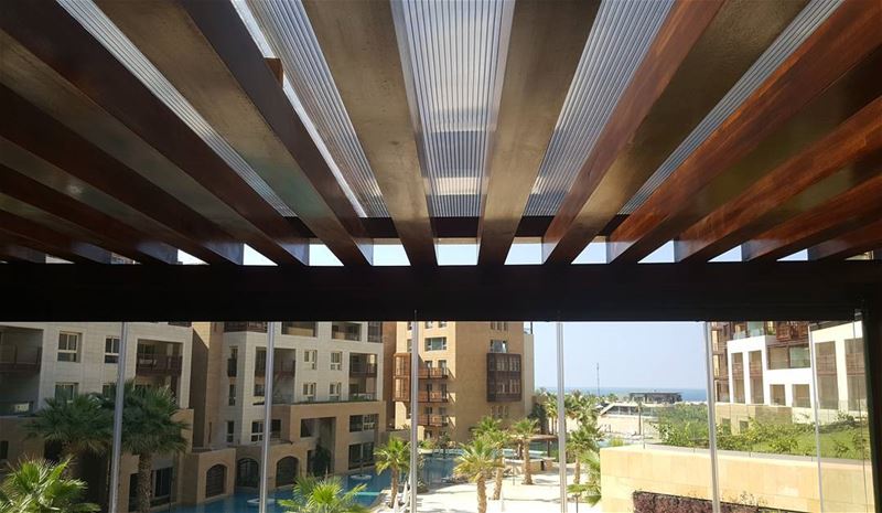  pergola  iroko  wood  curtainglass  polycarbonate  shade  design  lebanon... (Kempinski Summerland Hotel & Resort Beirut)