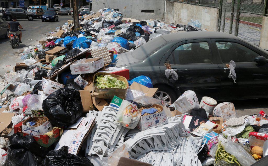 Piles of Garbage Blocking a Car in Dekwaneh