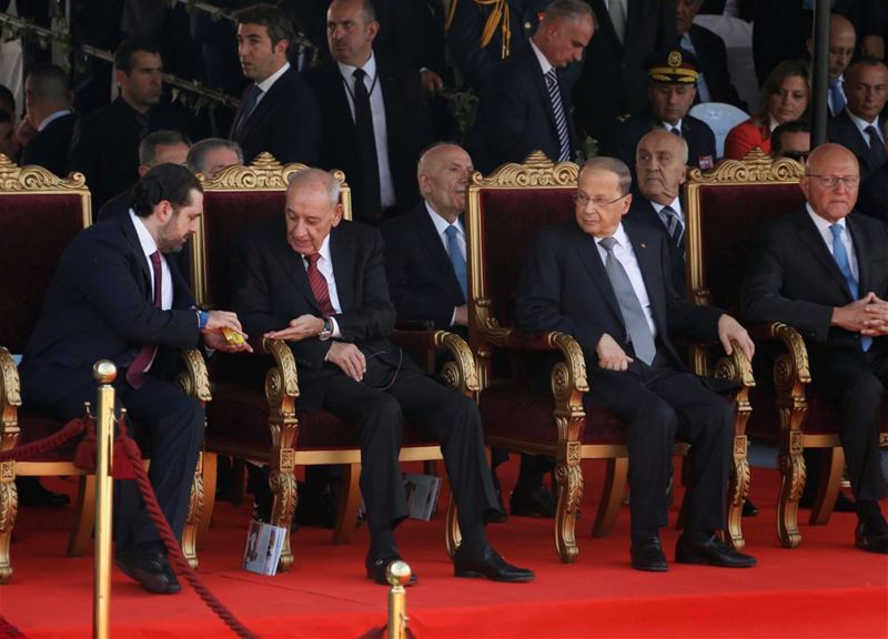 PM -designate Saad al-Hariri sharing some candy with parliamentary speaker Nabih Berri