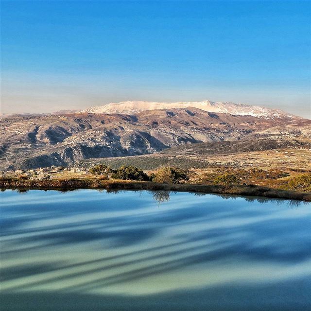 Sannine, as seen from Falougha lake  shadows  trees  mountains  villages ...
