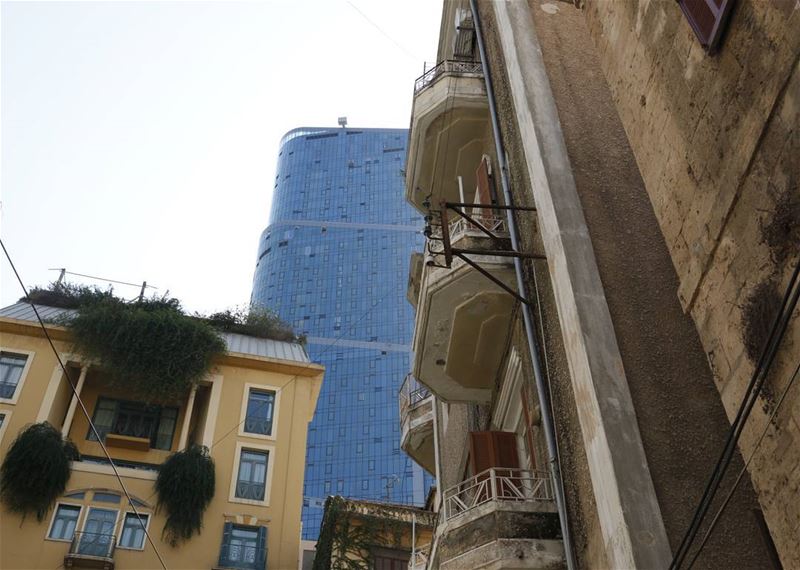 Seeing a tall glass building through the old smell of the city...... (Achrafieh, Lebanon)