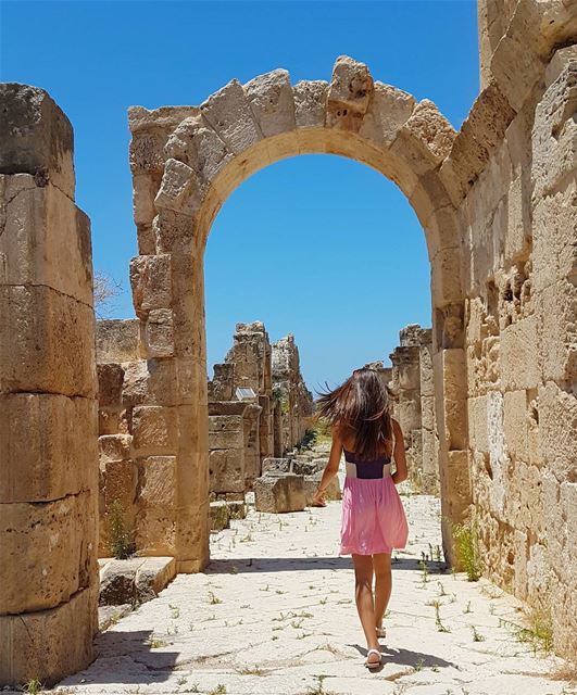 She doesn't lead, nor follow. She makes her own path 🏛   livelovebeirut ... (Roman ruins in Tyre)