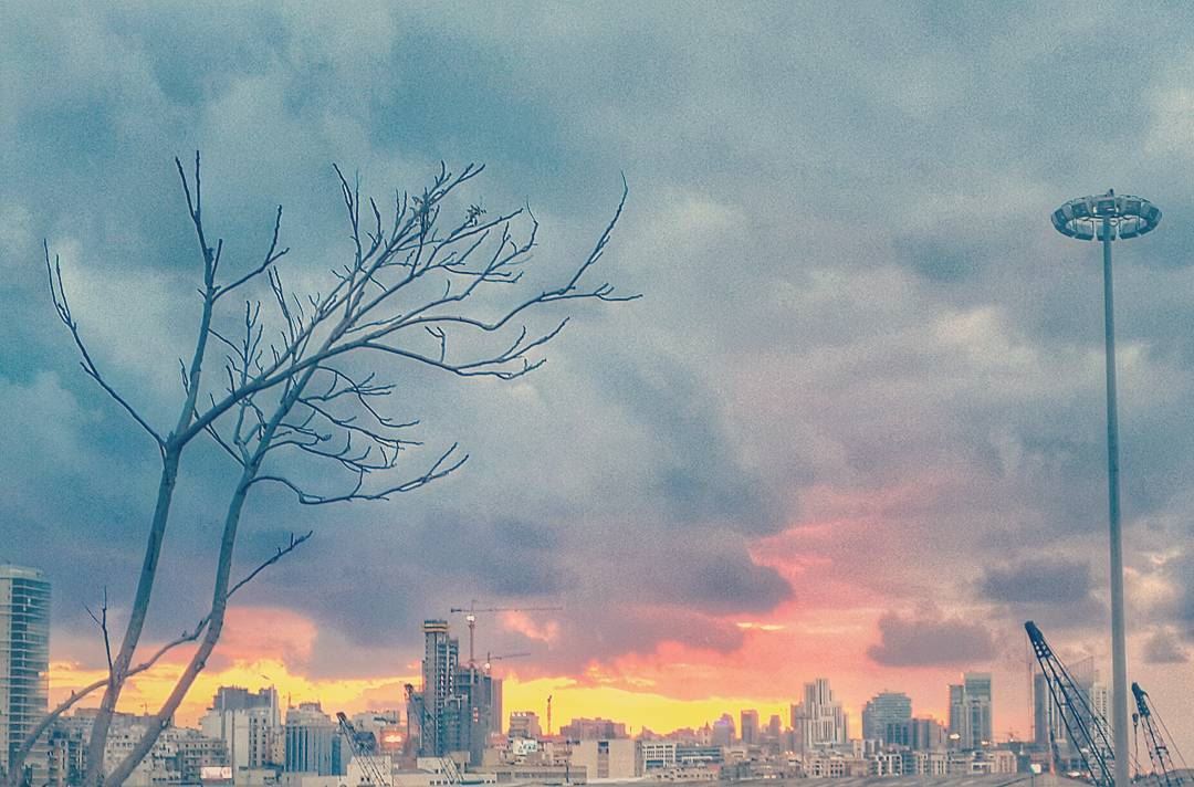  sunset after a  rainyday in  lebanon  beirut  urban  city , with a ...