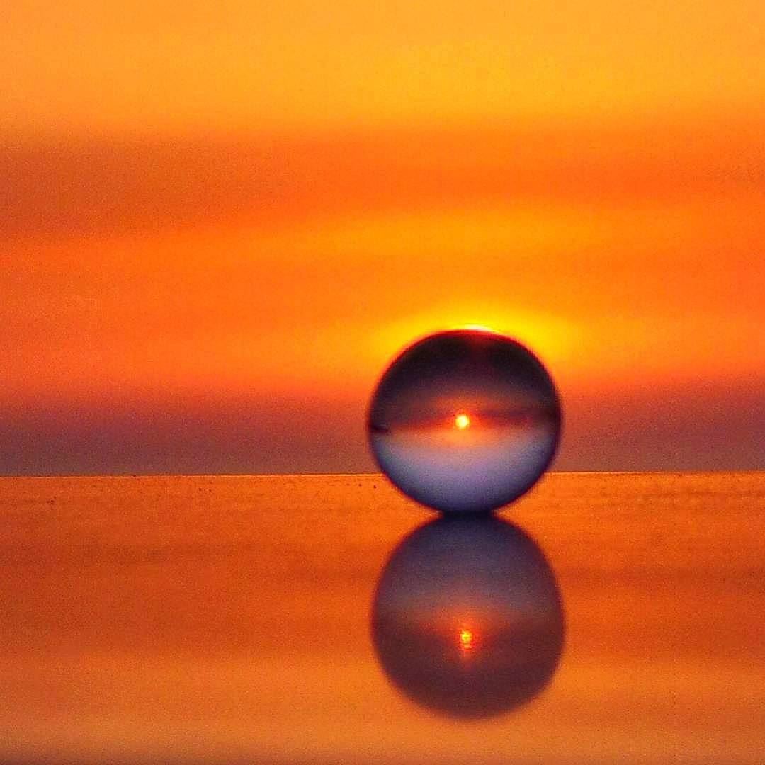Sunset through a small ball ~~~~~~~~~~~~~~~ nikontop_  nikonworld ... (Radio voix du liban 93.3 - اذاعة صوت لبنان)