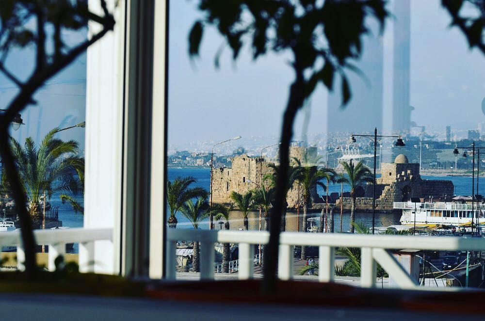 Tawlet Saida looks out on the old port and the Sea Castle. A beautiful...