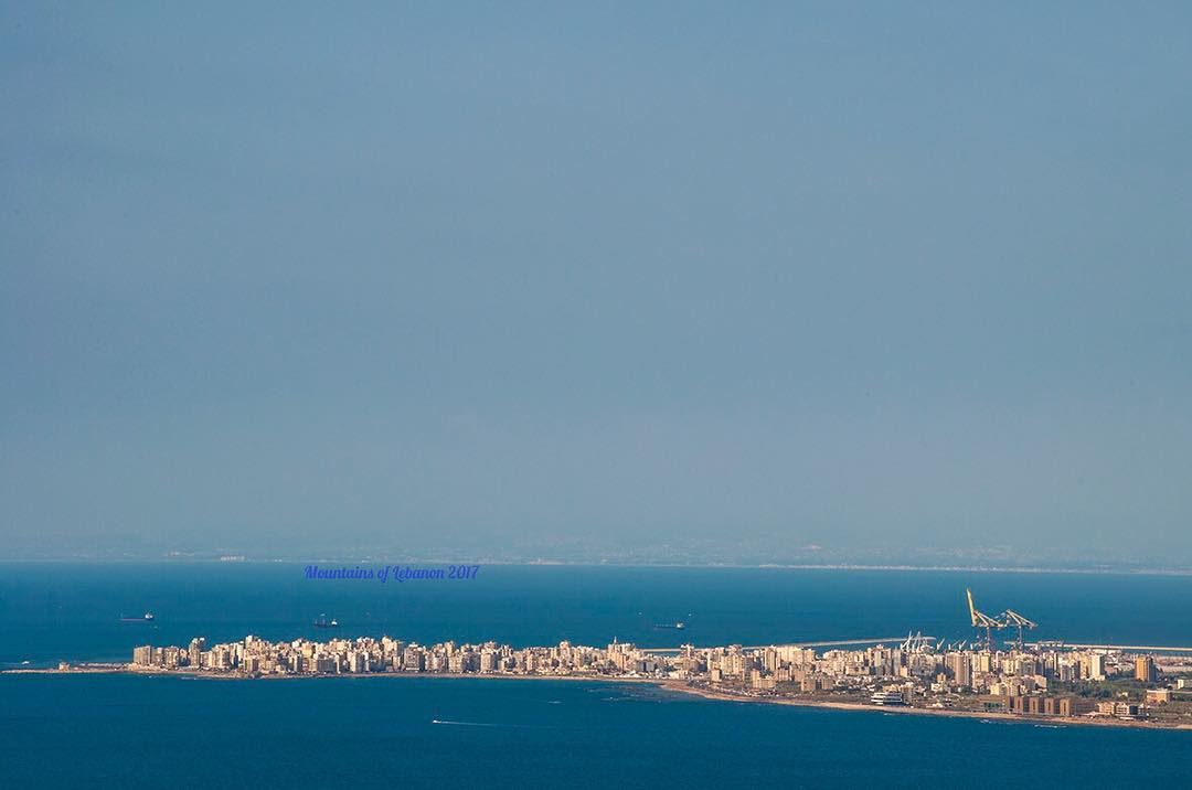 The al-mina, the giant cranes of Tripoli's Port and far lost in the... (Al Mina', Liban-Nord, Lebanon)