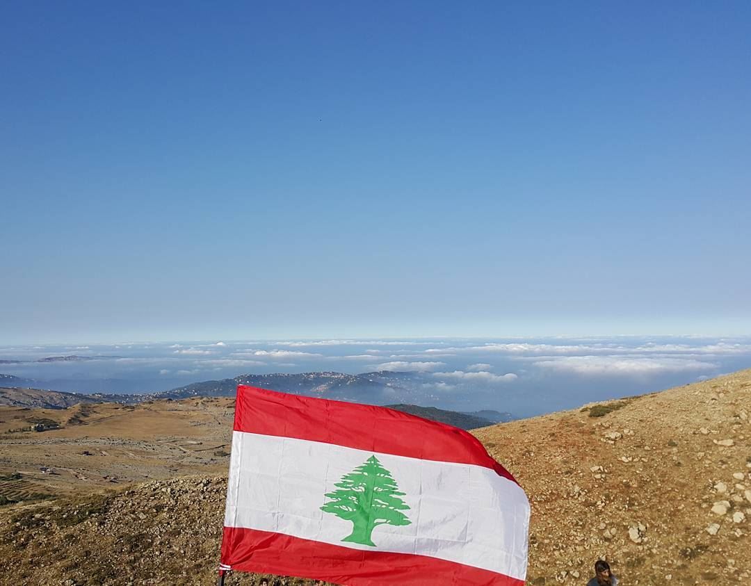 The lebanese flag @ 2300 m Red for blood and revolutionWhite for snow...