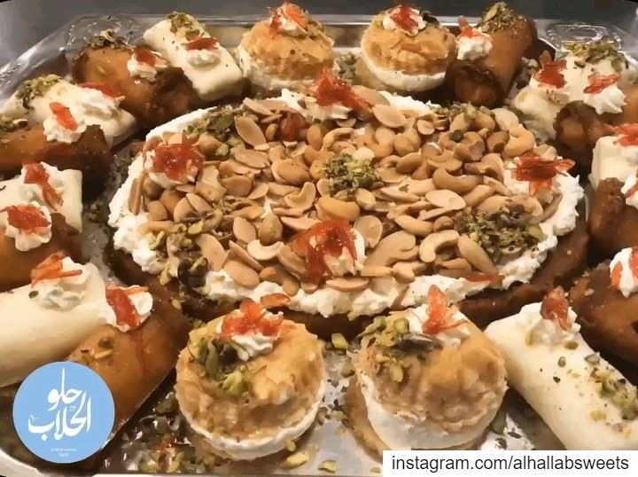 The magic of sweets 💕 A momentary glimpse of love 😍😋------------------- (Abed Ghazi Hallab Sweets)