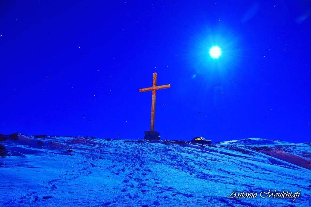 Under the moonlight 🌝 ✨  nightlife  moon  cross  snow  stars ... (Ehden, Lebanon)