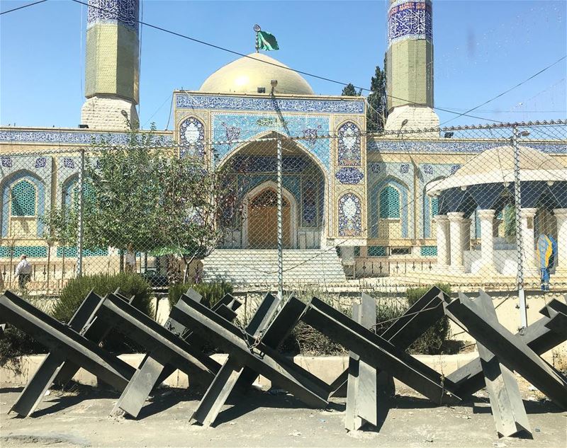 War and Peace.  baalbek  mosque  livelovelebanon  travel  contrast ... (مقام السيدة خولة (ع))