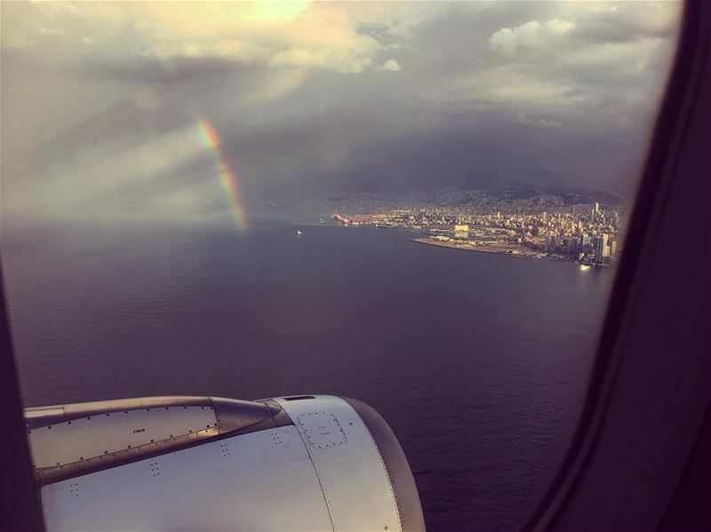 "We live in a rainbow of chaos".. rainbow  chaos  sky  skyline  airport ... (Hamra street , Beirut - شارع الحمرا ، بيروت)