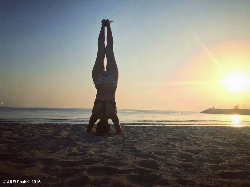  yoga  headstand  today  sunset  weekend   southlebanon  sour  beach ... (Sour Beach)