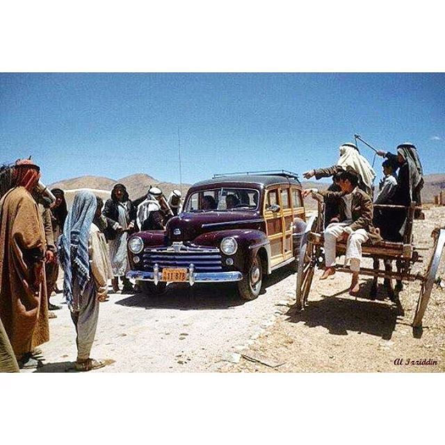 68 Years ago - Bekaa Valley on 24 May 1948 - the Photographer Ivan And his crew driving a woodie Car asks for directions to Baalbeck .