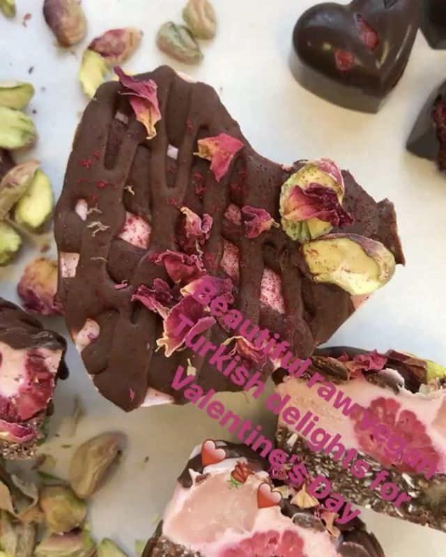 A beautiful chocolate topped, rose essence, raspberry filled L❤️VE cake... (Go by U Energy)