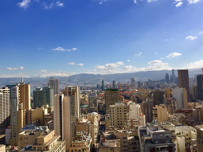 A beautiful sunny day with the white mount sannine on the background!... (Beirut, Lebanon)