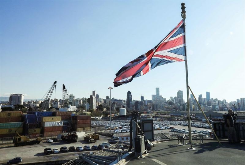 A British unionjack flag flying from the Royal Navy’s HMS Ocean (L12) amphibious assault ship as it lies docked in the port of Beirut. (ANWAR AMRO / AFP) via pow.photos