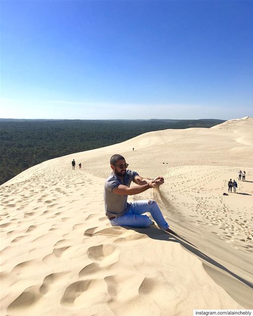 A  dune stuck between the forest and the ocean 💚 ... (Dune du Pilat)