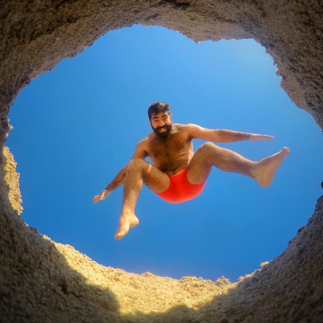 A Hole New World 🕳 jump  fun  hole  legs  sky  summer  beach  beard  air... (Bahr Sour)