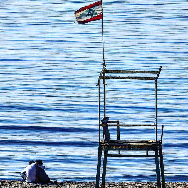 A Lebanese couple were kissing on ramlet elbayda beach - Beirut (photo by...