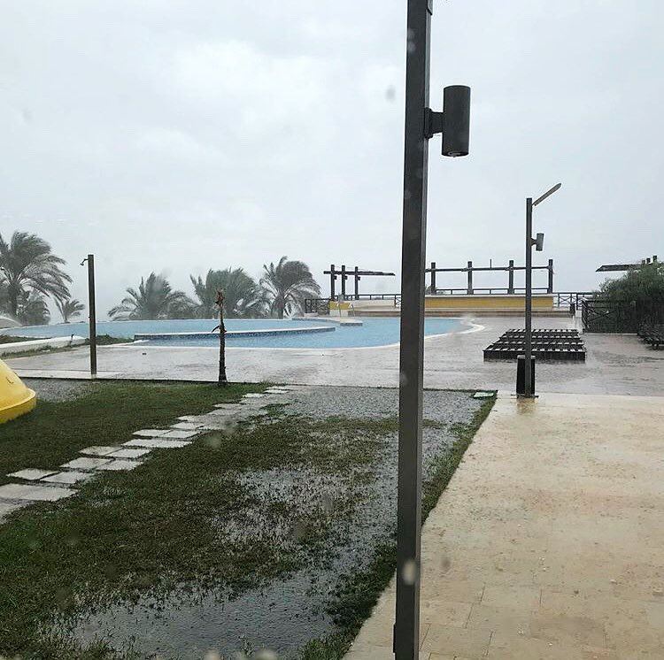 A rainy day at the beach is better than a sunny day at the office.. @pangea (Pangea Beach Resort)