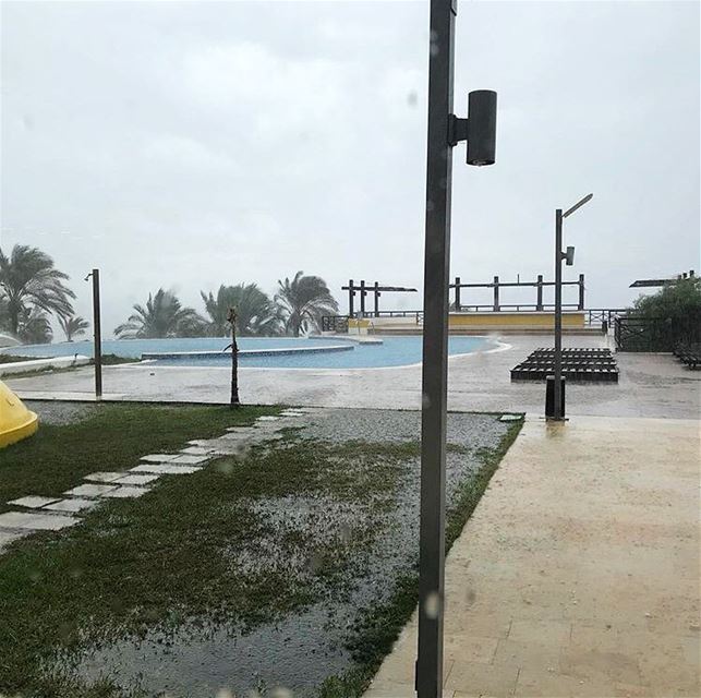 A rainy day at the beach is better than a sunny day at the office.. @pangea (Pangea Beach Resort)