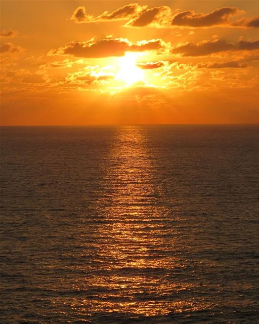 ... About to slip down in the sea;How would you like to dip with me? 🌞🌅... (Beirut, Lebanon)