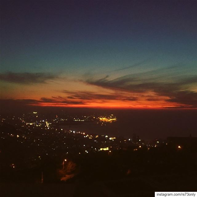 Another  sunset over  beirut  city  lights  skyline  red   orange  hues ...