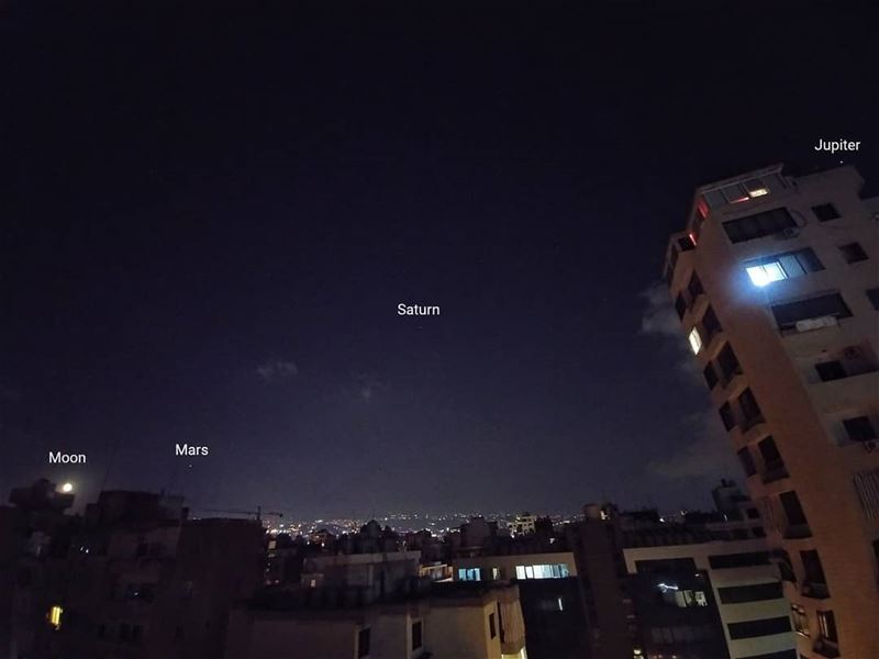 Beautiful alignment of the Moon, Mars, Saturn and Jupiter. Saturn is the...