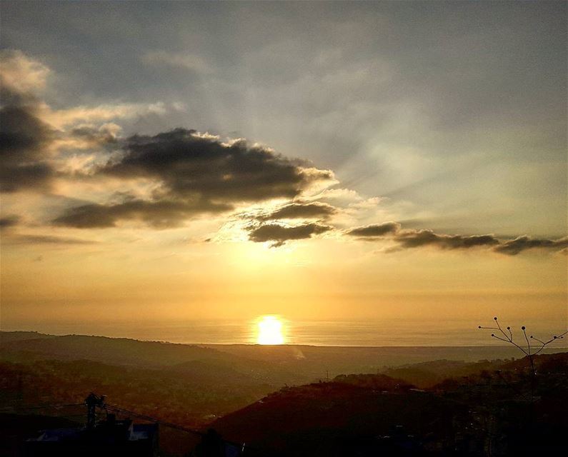 Behind a dark cloud is a silver lining.. reflection  sunset  sunrays ...