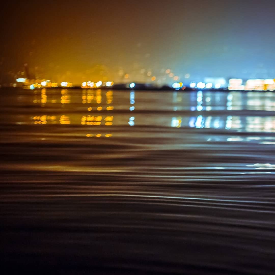  beirut  city  cityscape  night  light  sea  ripples  water  reflection ...