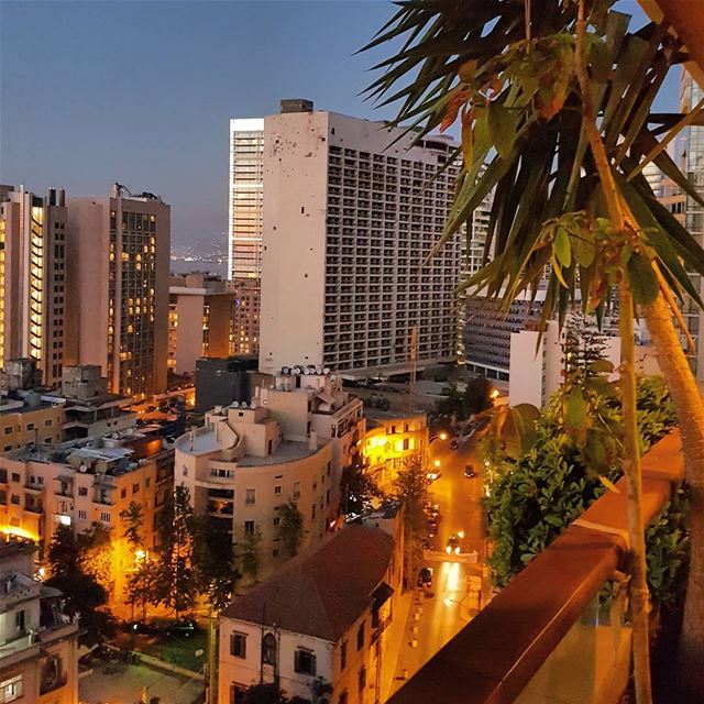  Beirut  sunset on iconic Holiday Inn hotel, which still bears the...