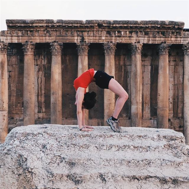 "Bending over backwards for the sake of a good shot" baalbeck ... (Baalbek, Lebanon)