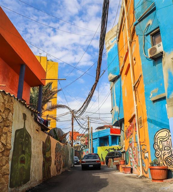 Blue Sky, clean roads, beautiful people, colorful buildings and artistic... (Al Ouzaii)