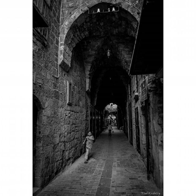  bnw  child  boy  running  blackandwhite  old  street  photography ... (Old Saida Souks)